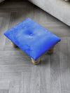 Small blue footrest pouffe