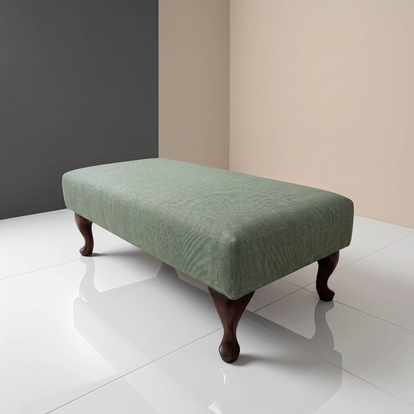 Bespoke upholstered footstool with luxury fabric finish and handcrafted construction