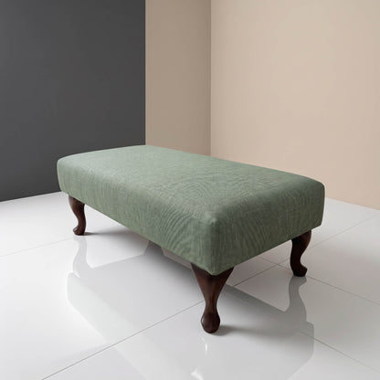 Bespoke upholstered footstool with luxury fabric finish and handcrafted construction