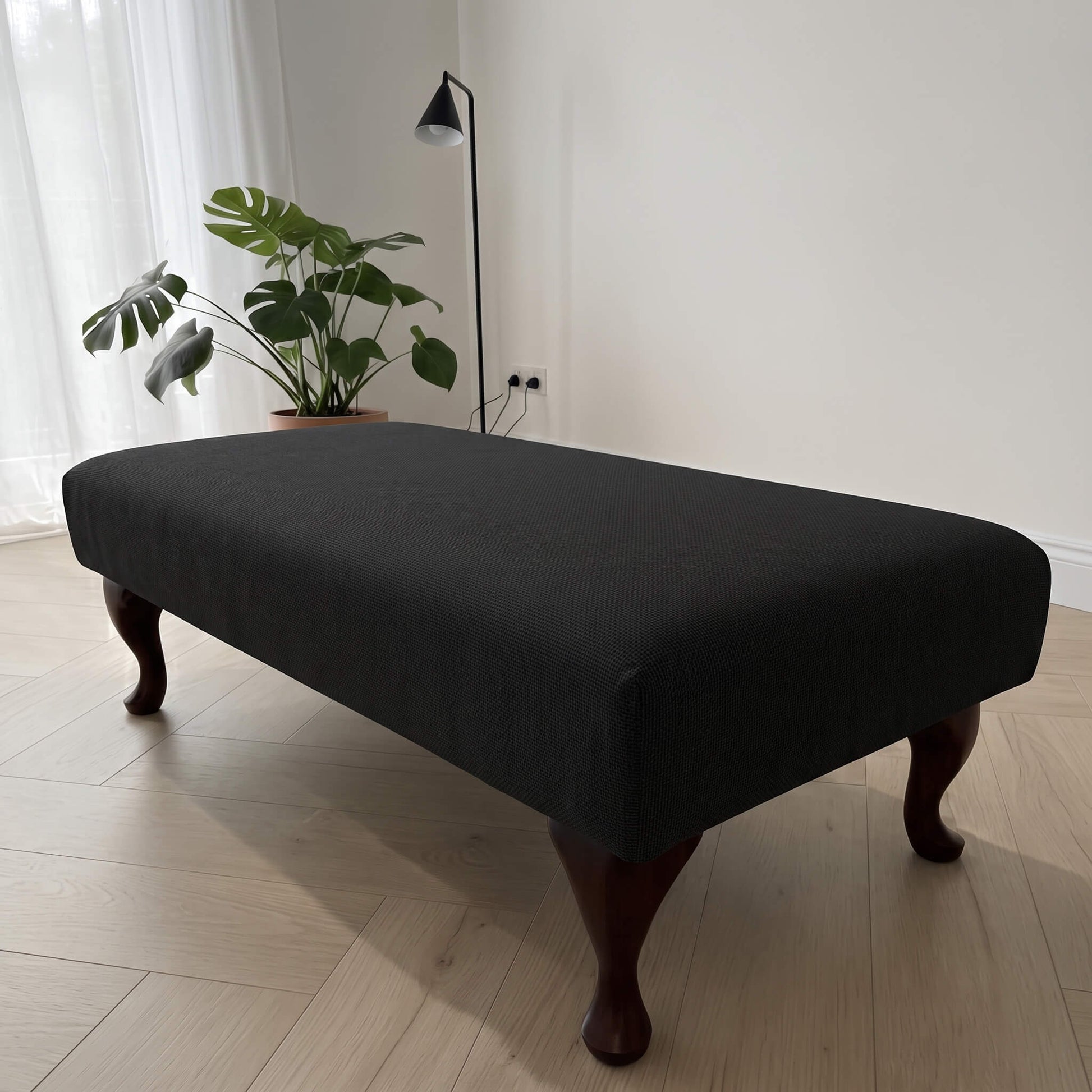 Custom non storage ottoman with premium upholstered finish designed as a luxury coffee table alternative