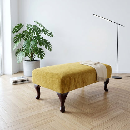 Handcrafted UK footstool with rich hue upholstery and premium non-storage pouffe design