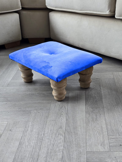 Small blue footrest pouffe