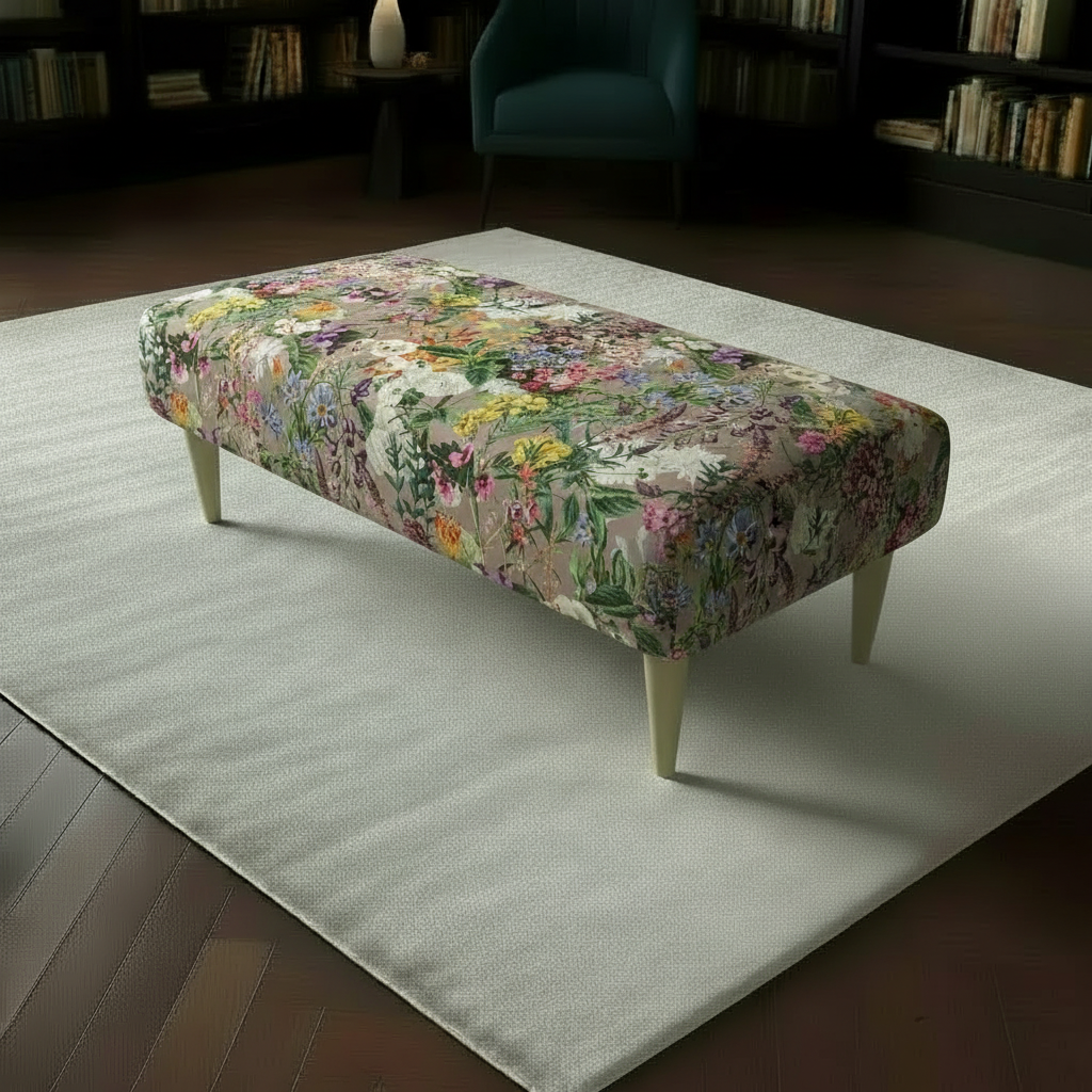Plush Upholstered Footrest with Vibrant Multi-Toned Fabric and Sleek Wooden Legs