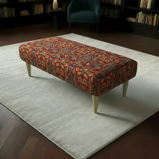 Premium Lounge Seating Ottoman with vibrant multi-toned designer fabric and sleek wooden legs