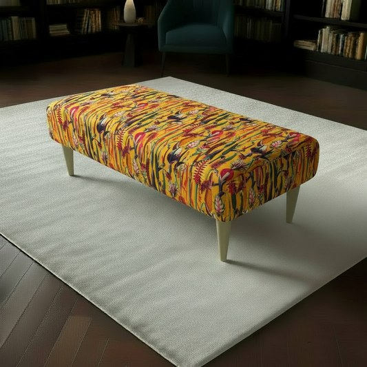 Rectangular coffee table ottoman with vibrant multi-toned abstract fabric