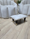 Small creamy white footrest pouffe