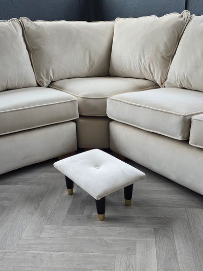 Small creamy white footrest pouffe